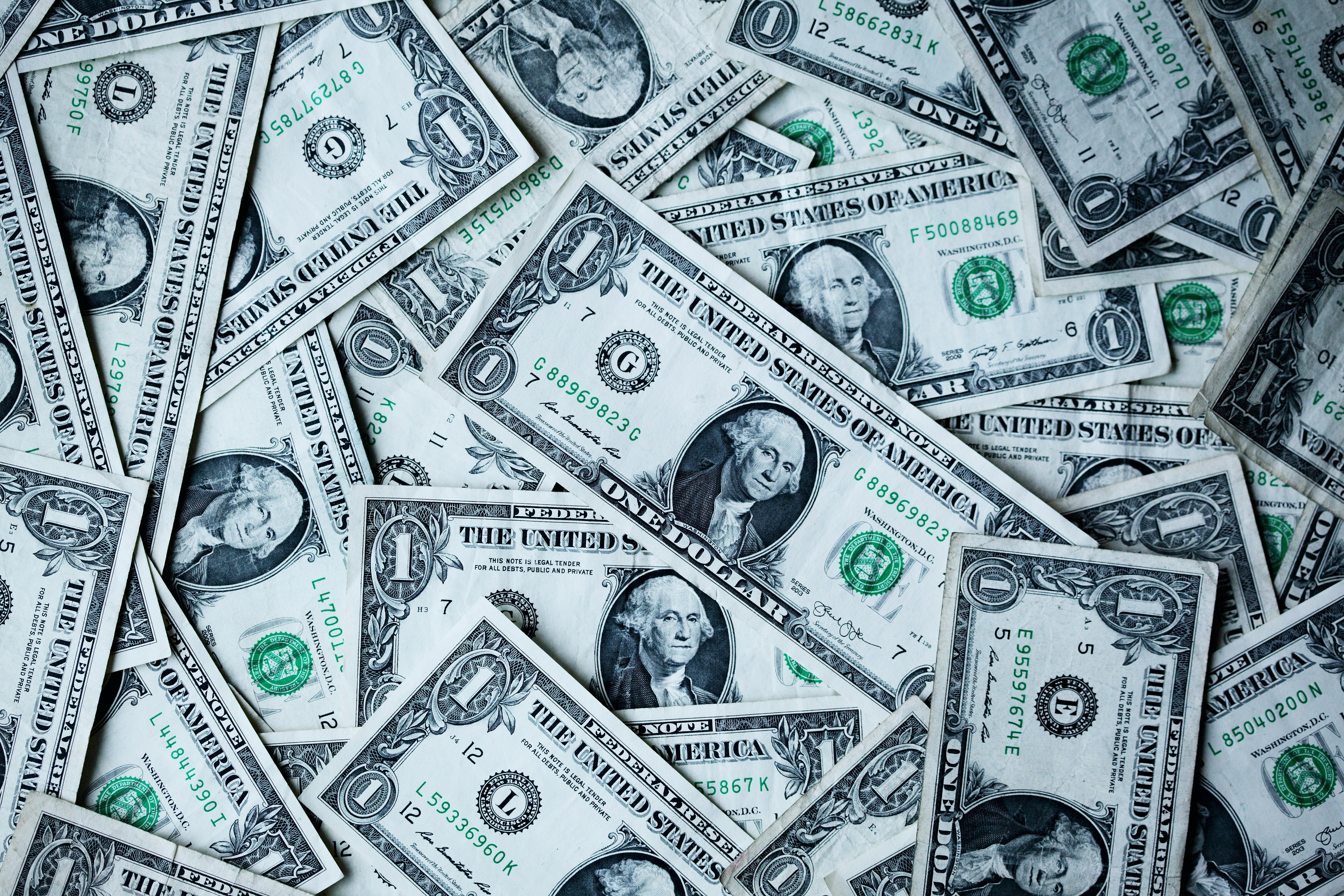 Cash and budgeting notebook on a desk
