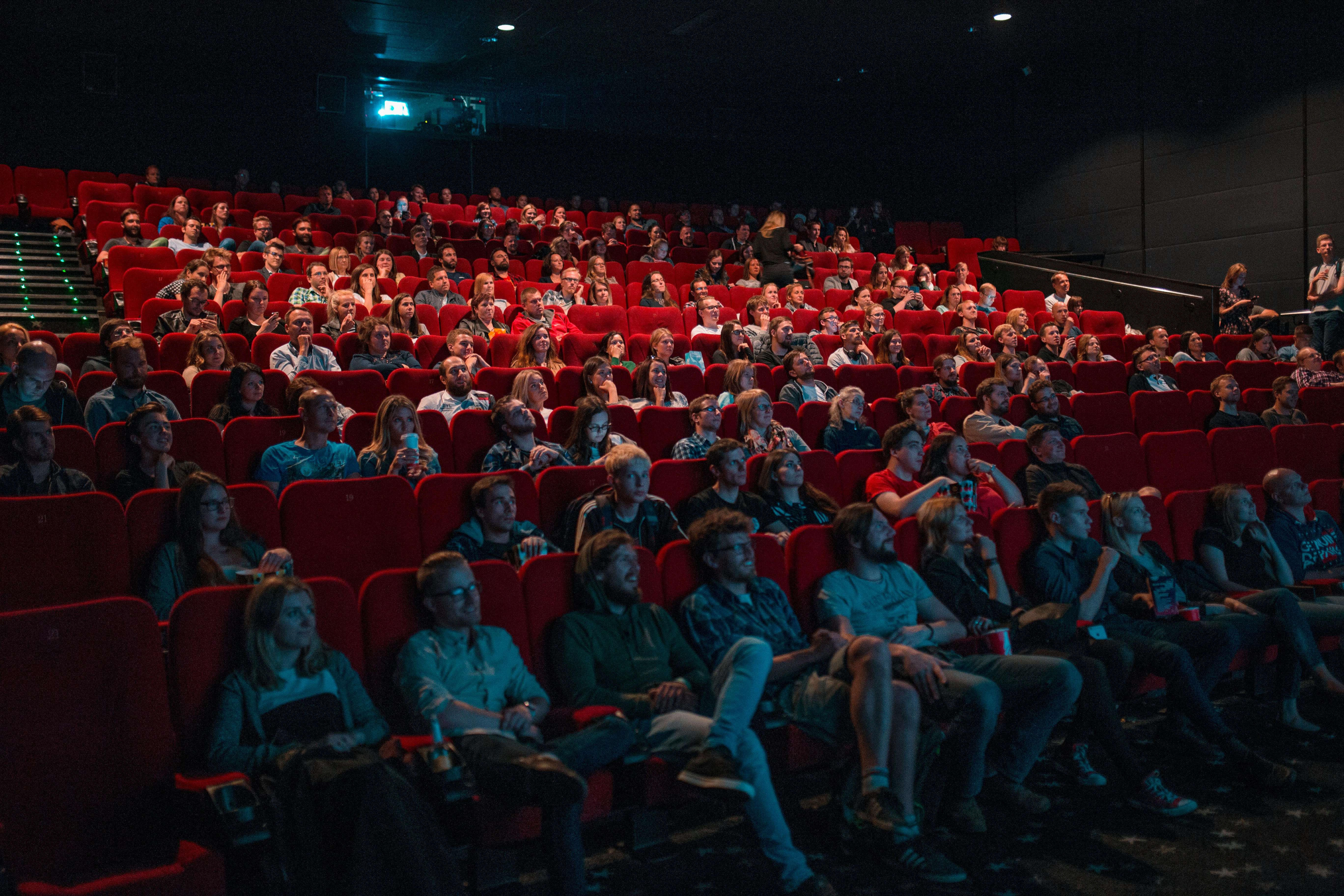 Cinema hall with movie screen lit up